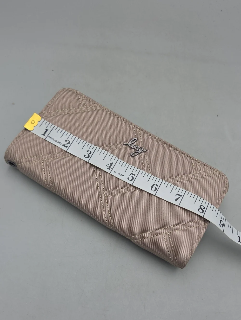 Lug Arabesque Ultra X Zip RFID Wallet in a sand Beige color